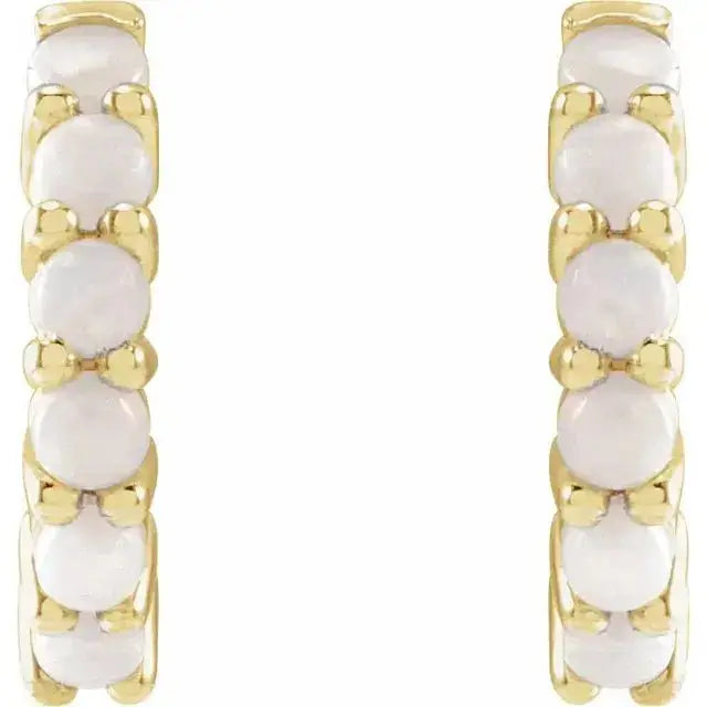 Elegant gold hoop earrings with natural white opals
