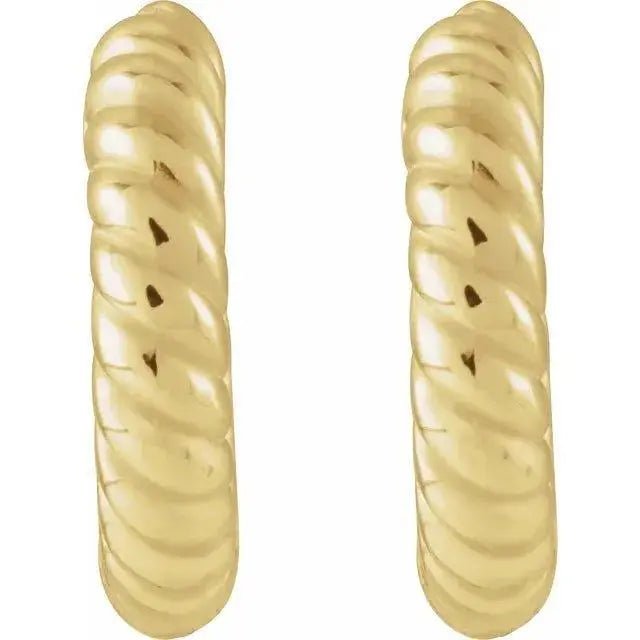 Side view of 12mm rope-textured hoop earrings in yellow gold