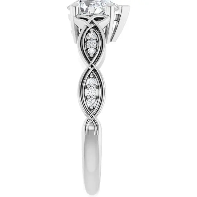 Handcrafted pear solitaire ring by Dimitrios Creations