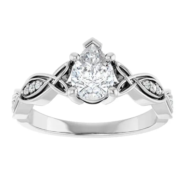14K gold pear-shaped diamond ring by Dimitrios Creations