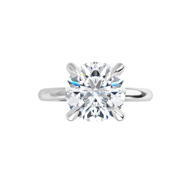 14K gold solitaire engagement ring with a 2 CT lab-grown diamond and lightweight 2mm shank for daily comfort.