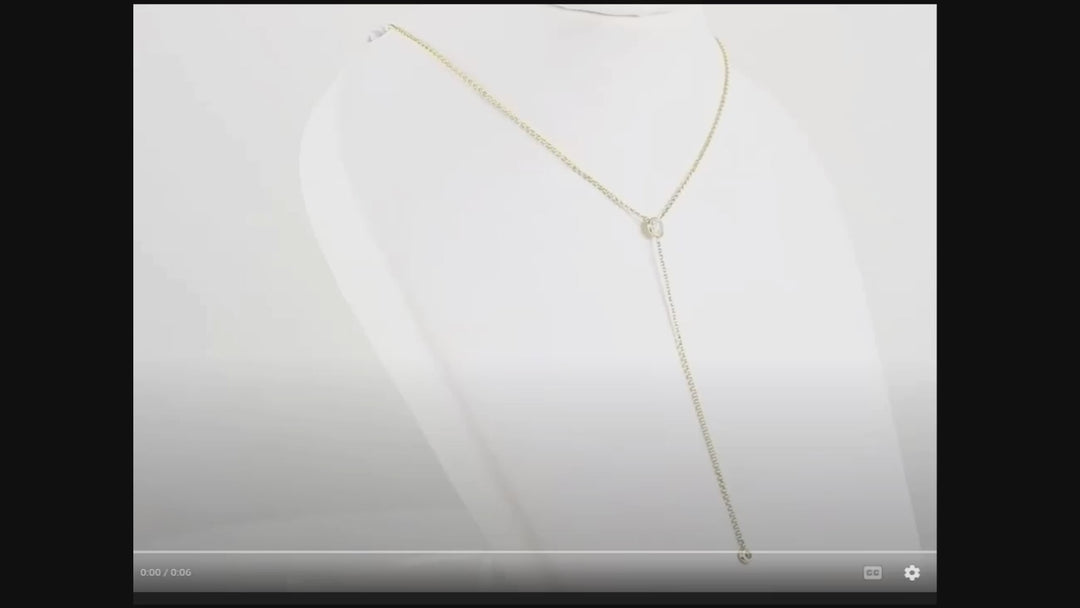 Minimalist gold necklace with delicate Y-shaped diamond pendant