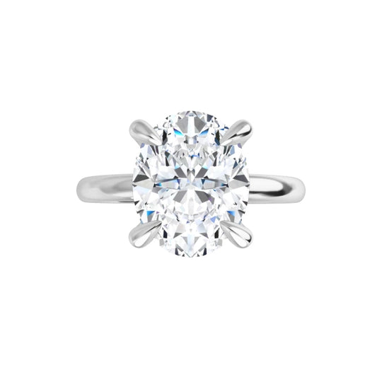 Sustainable lab-grown oval diamond ring with DEF color and VVS clarity.