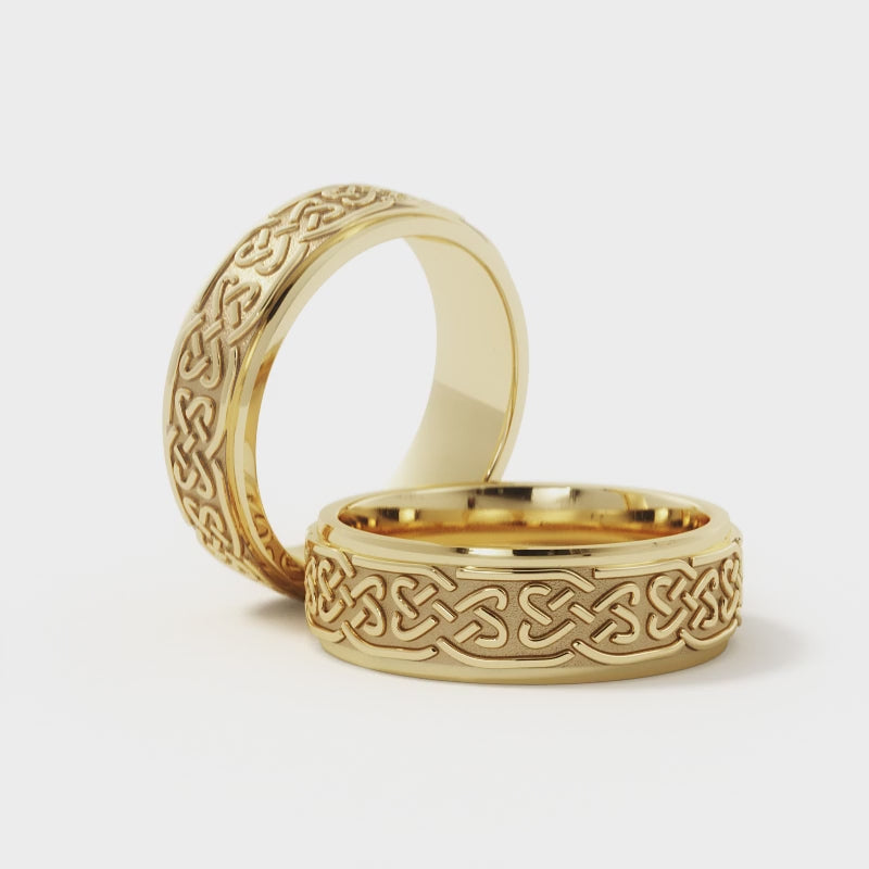 Matching Love Celtic Wedding Rings in 14K yellow gold with intricate Celtic knot engravings. A timeless and elegant choice for couples.