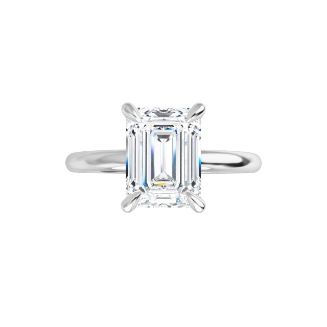 Luxury lab-grown diamond ring with emerald-cut stone and minimalist design.