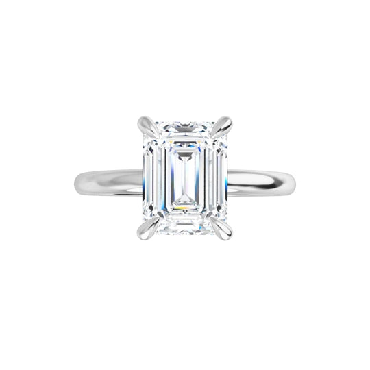 Luxury lab-grown diamond ring with emerald-cut stone and minimalist design.