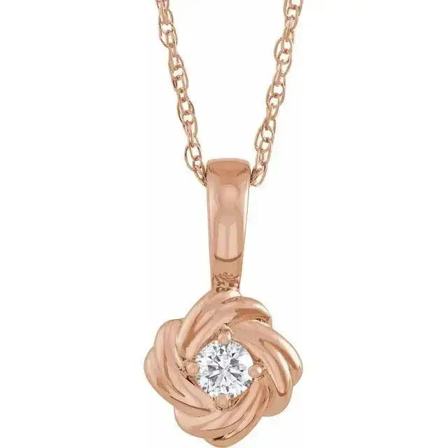 Rose gold Rose Pendant featuring a delicate floral motif and a brilliant diamond center. A handcrafted, timeless accessory for elegant styling.