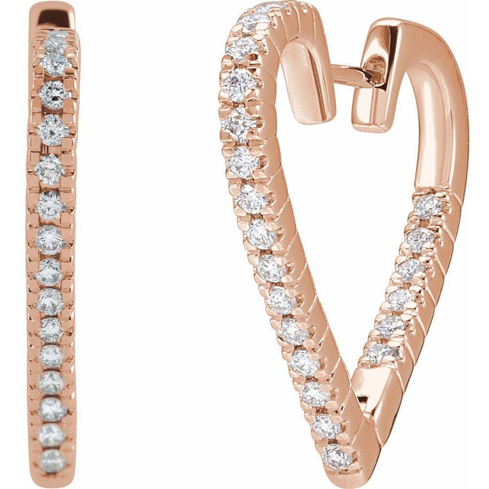 Pair of 14K gold Heart Hoop Earrings positioned to showcase their lightweight feel and perfect symmetry.