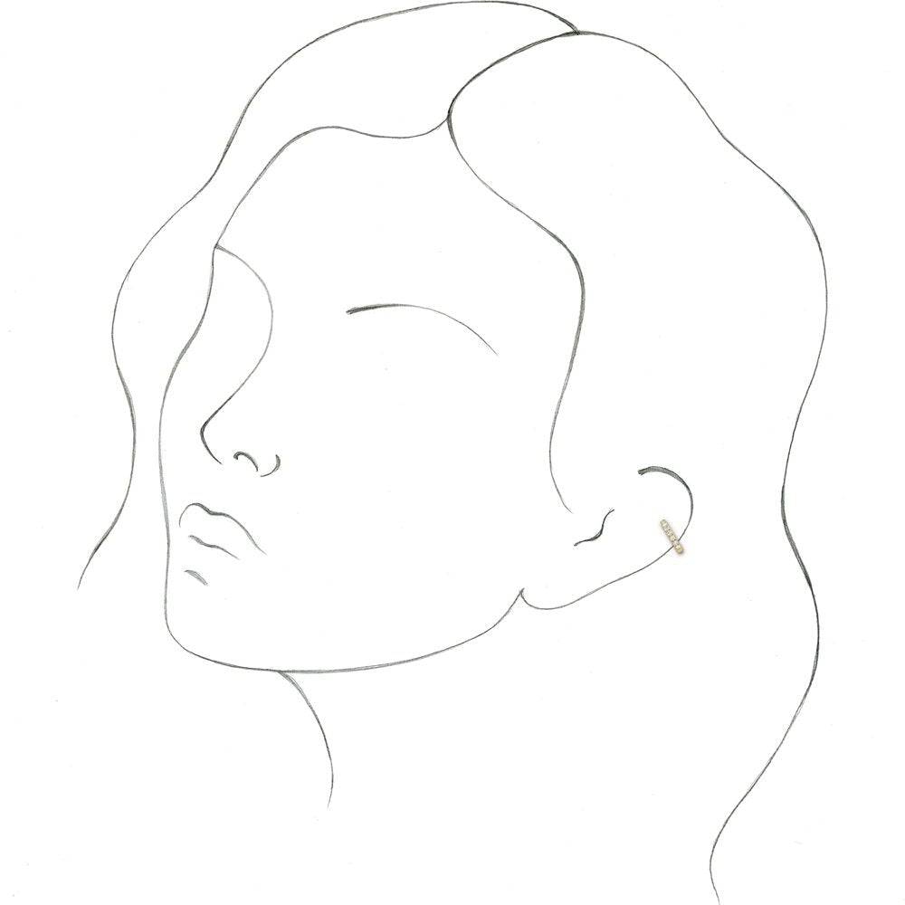 Woman wearing a Diamond Ear Cuff, showcasing its elegant fit and brilliant sparkle sketch