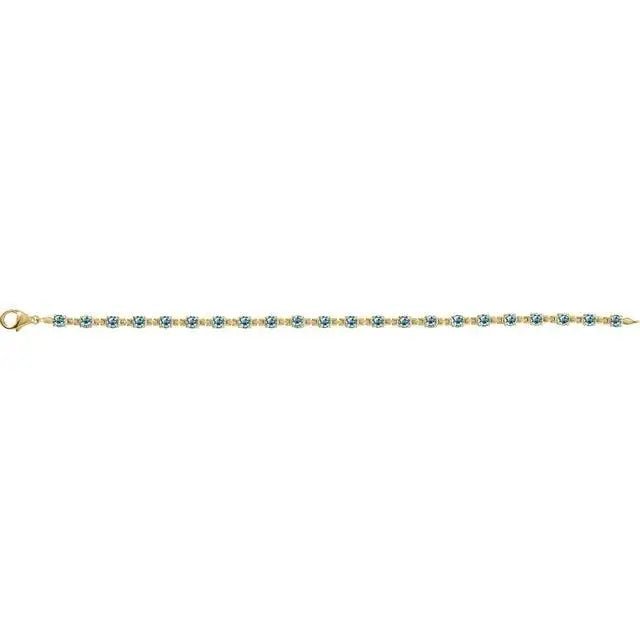 Handcrafted sky blue topaz bracelet with a timeless tennis design