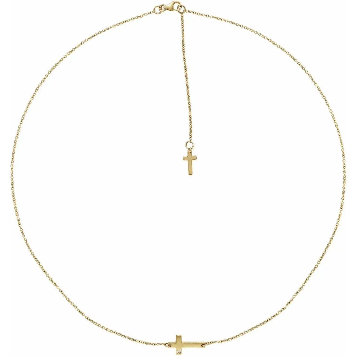 Close-up photo of 14K gold sideways cross necklace with adjustable chain, handcrafted in NYC.
