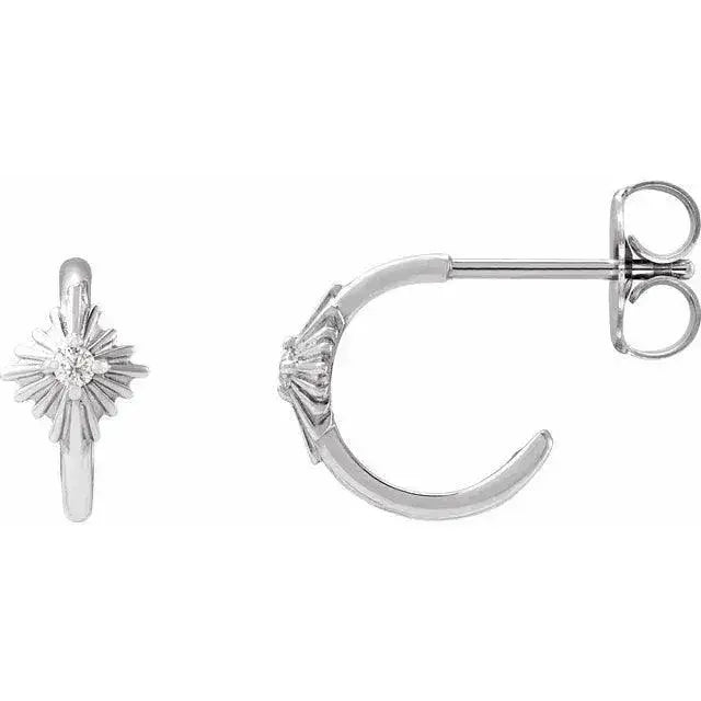 White gold Starburst Hoop Earrings featuring a brilliant diamond accent. A timeless and sophisticated jewelry piece with celestial-inspired details.