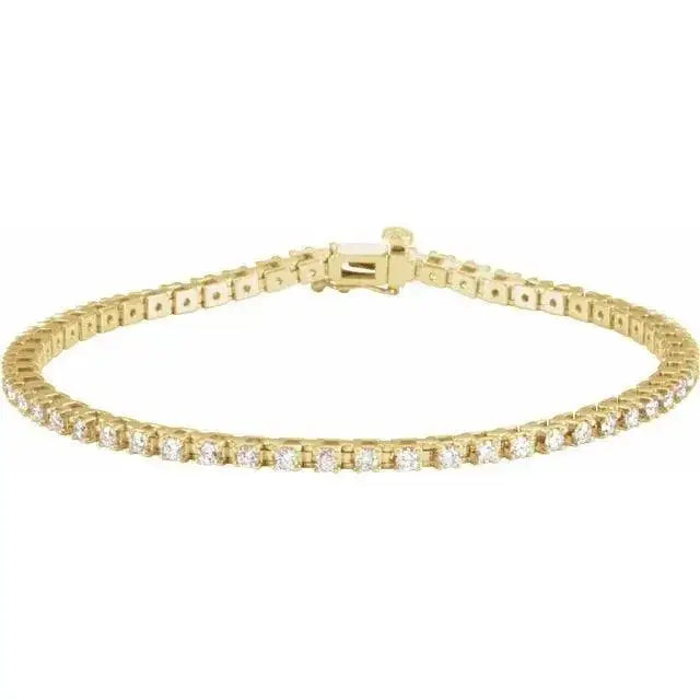 Luxurious 2.25CT tennis bracelet in solid yellow gold, adorned with brilliant lab-grown stones. A perfect handcrafted jewelry gift for milestones.