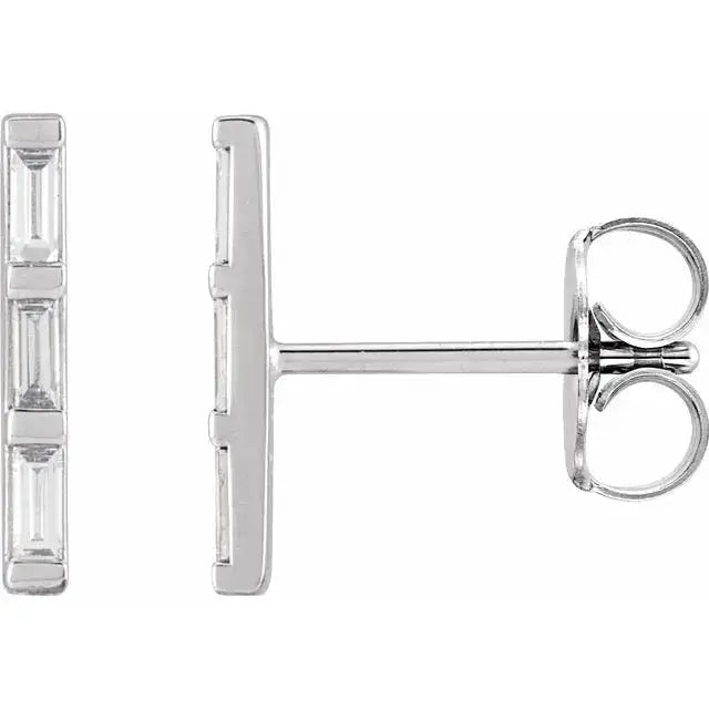 Three Baguette Diamond Bar Earrings in 14K white gold with natural diamonds. Sleek and sophisticated stud earrings featuring 0.45 carats of diamonds.