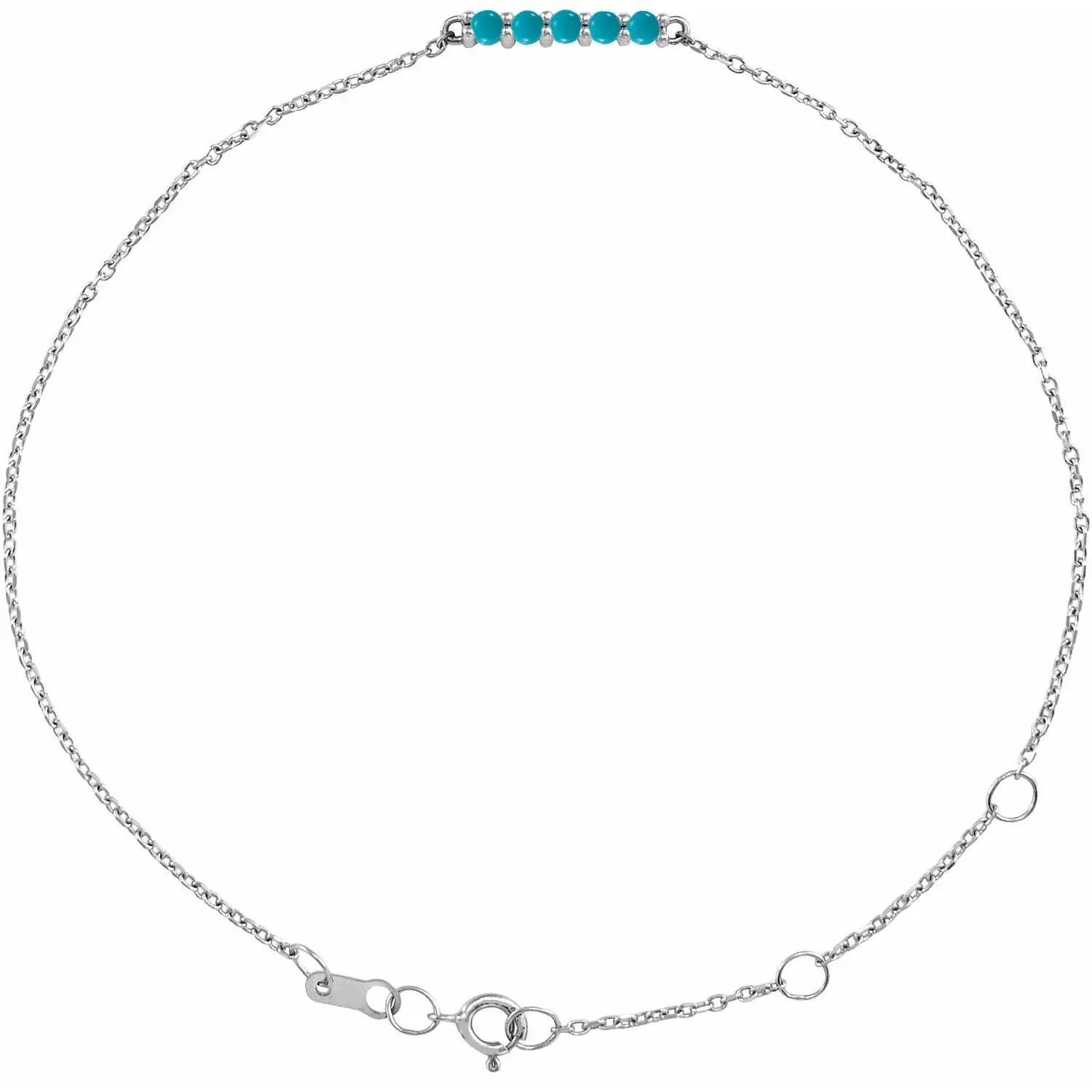 Delicate silver turquoise bolo bracelet featuring a fine chain with five vibrant turquoise gemstones. Adjustable and elegant for everyday wear.