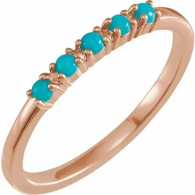 Turquoise Cabochon Stackable Ring in 14K rose gold, featuring seven prong-set turquoise cabochons for a warm and stylish jewelry accent.