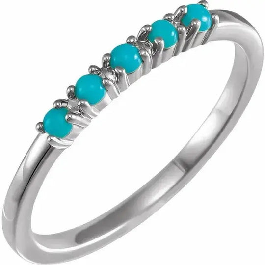 Turquoise Cabochon Stackable Ring in 14K white gold with seven vibrant turquoise cabochons, offering a modern and elegant jewelry piece.