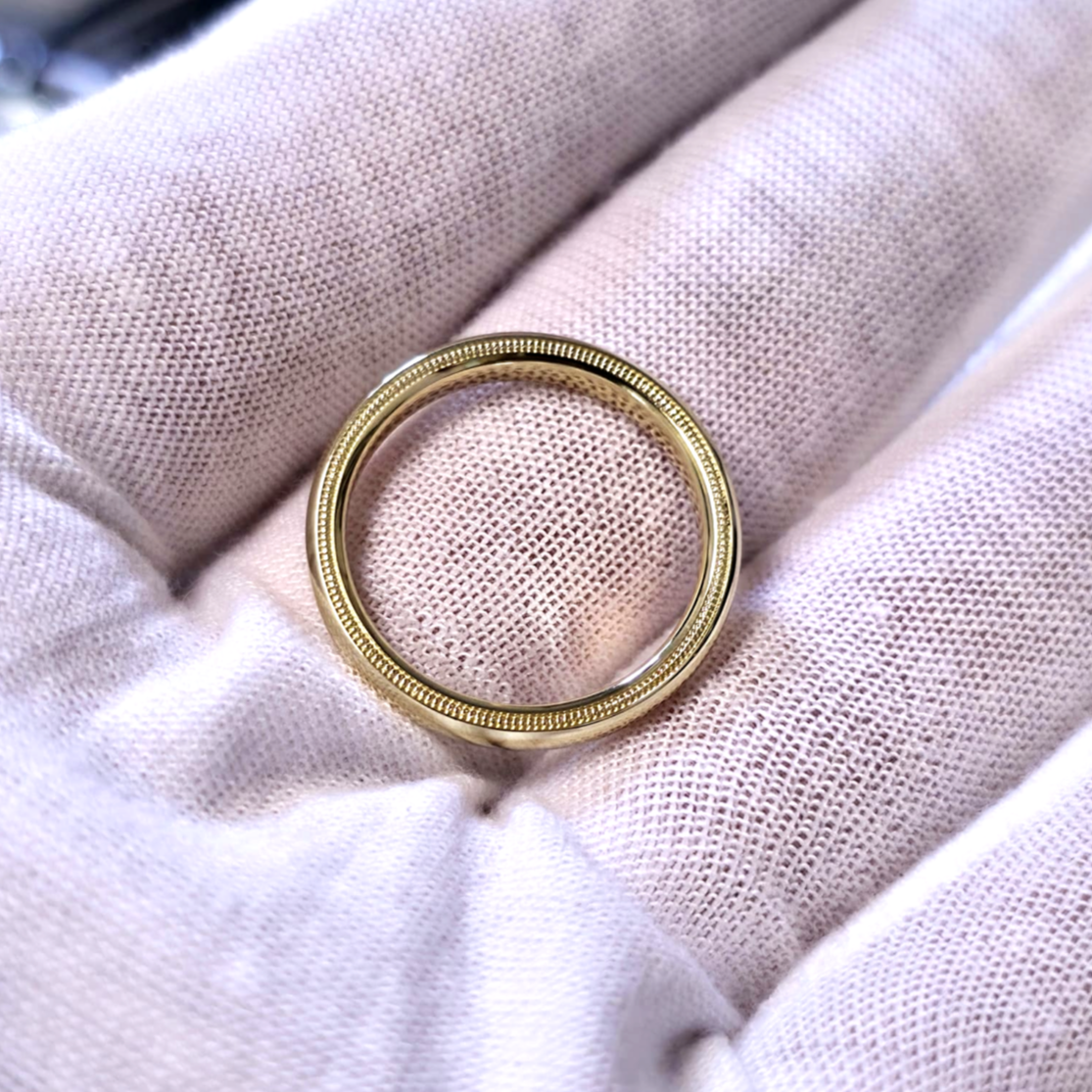 14k gold wire ring with milgrain detail by Dimitrios Creations – floating side view